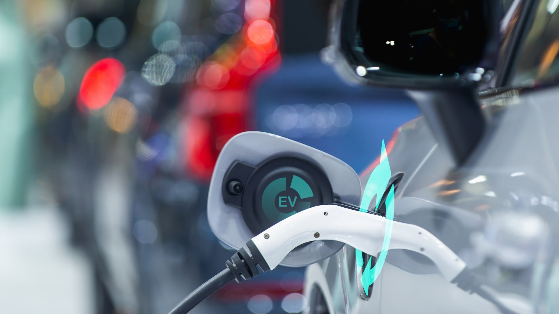 About us – accelerating responsible mobility-min Charger plugged into an EV