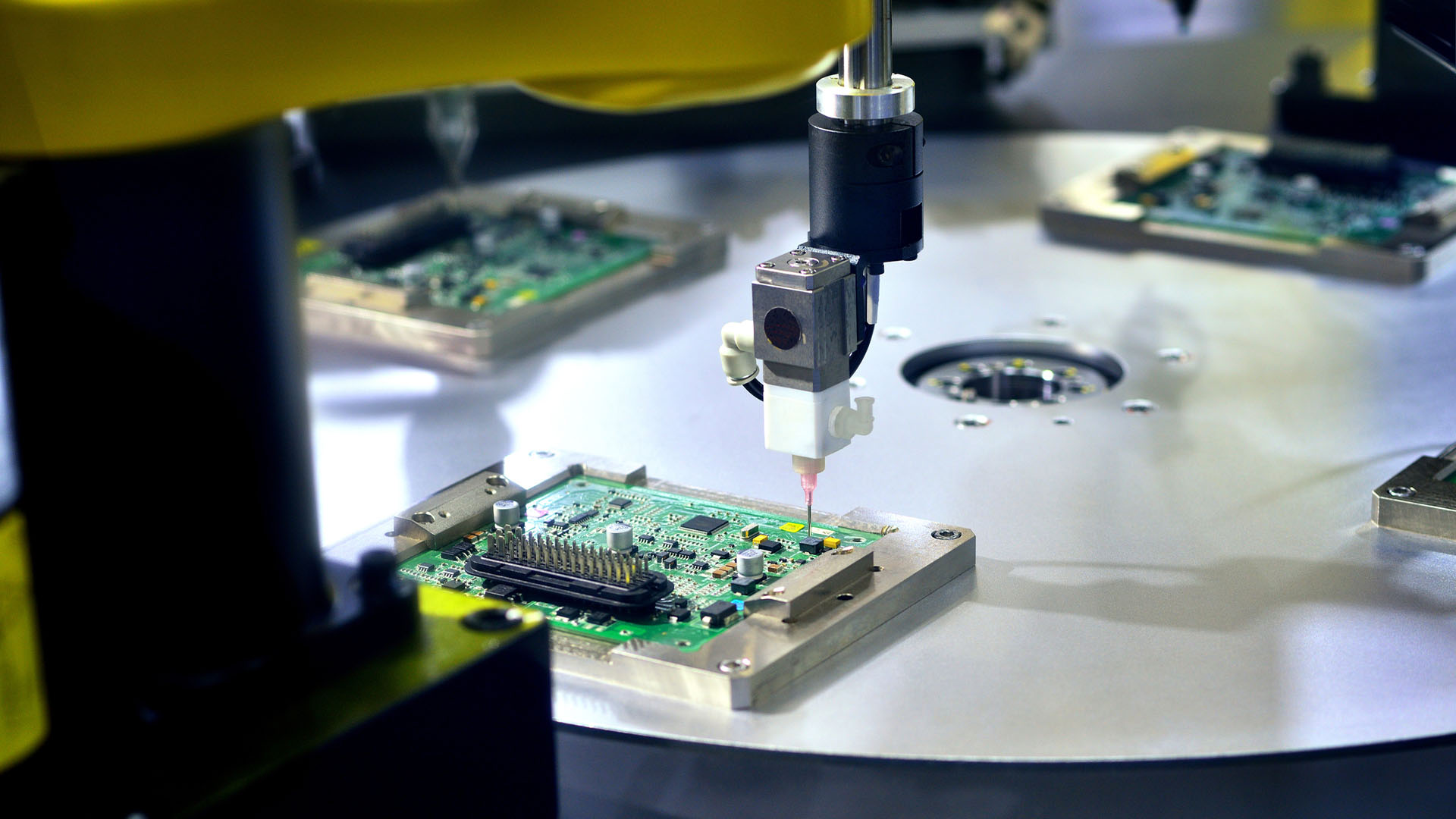 No room for error_ Zero defect through fully automated production 2 Robot arm soldering a chip